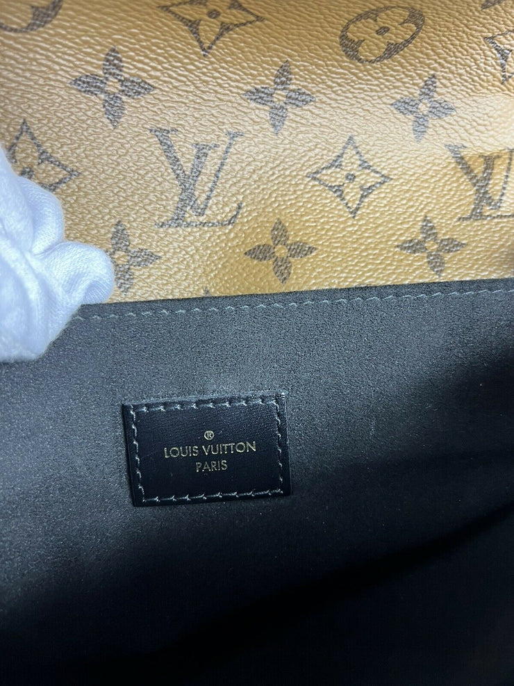 Louis Vuitton Pochette Metis Handbag with Reverse Monogram Canvas